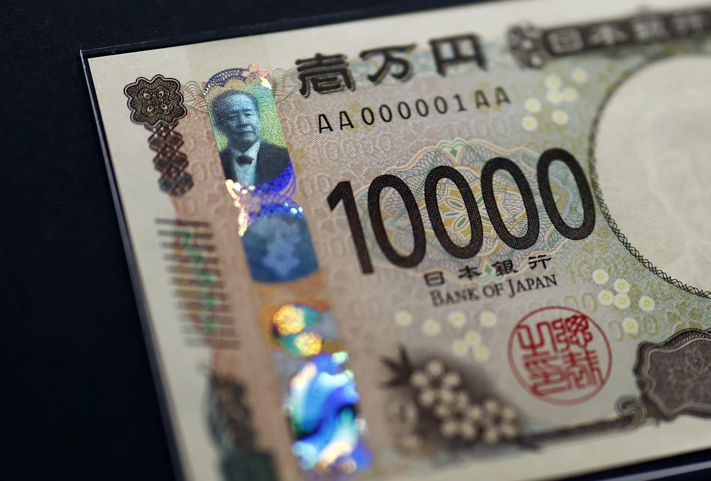 弱い円にさらなる試練、混迷化の日本政治にリスク－関税懸念も消えず - Bloomberg