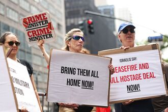 Demonstrators Protest Against Israeli PM Netanyahu Outside Of The Israeli Consulate In NYC During His Visit To D.C.