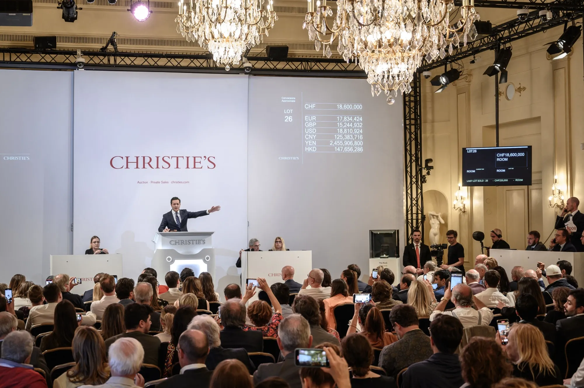 A Christie's auctioneer gestures during an auction&nbsp;in Geneva, Switzerland in May 2022.