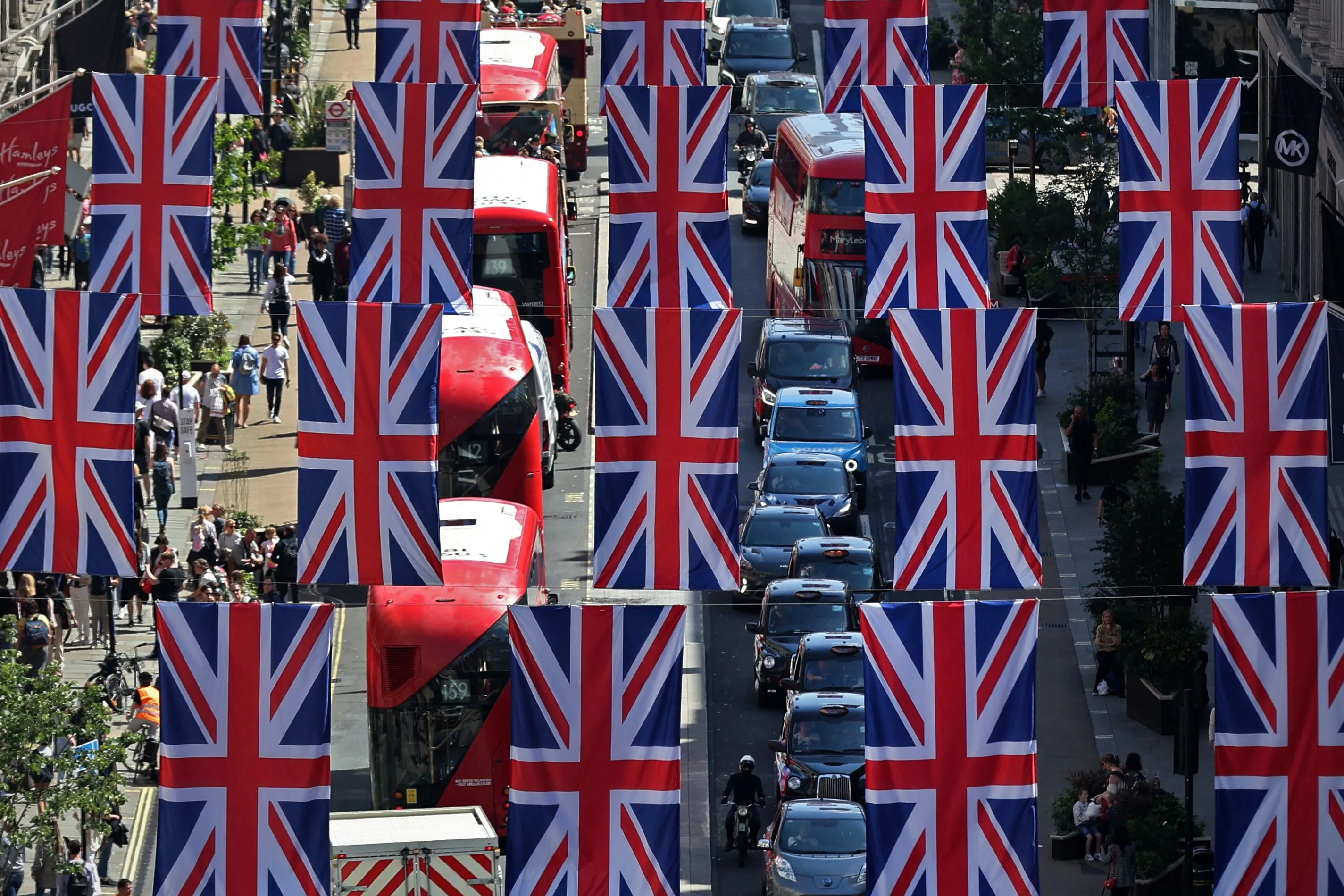 Buses and taxis travel on Regent Street in central London on May 27.&nbsp;