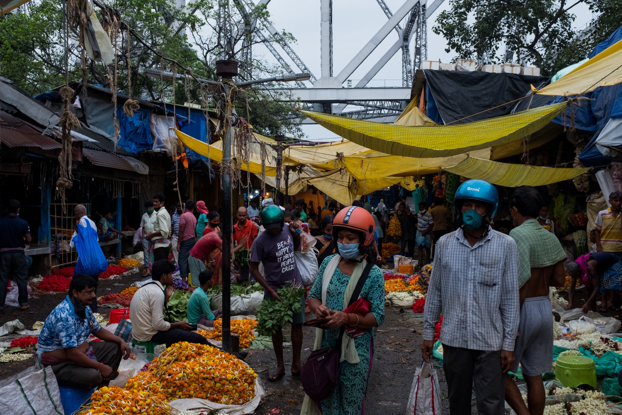 Shoppers at Mullick Ghat flower market in Kolkata, Sept. 22.