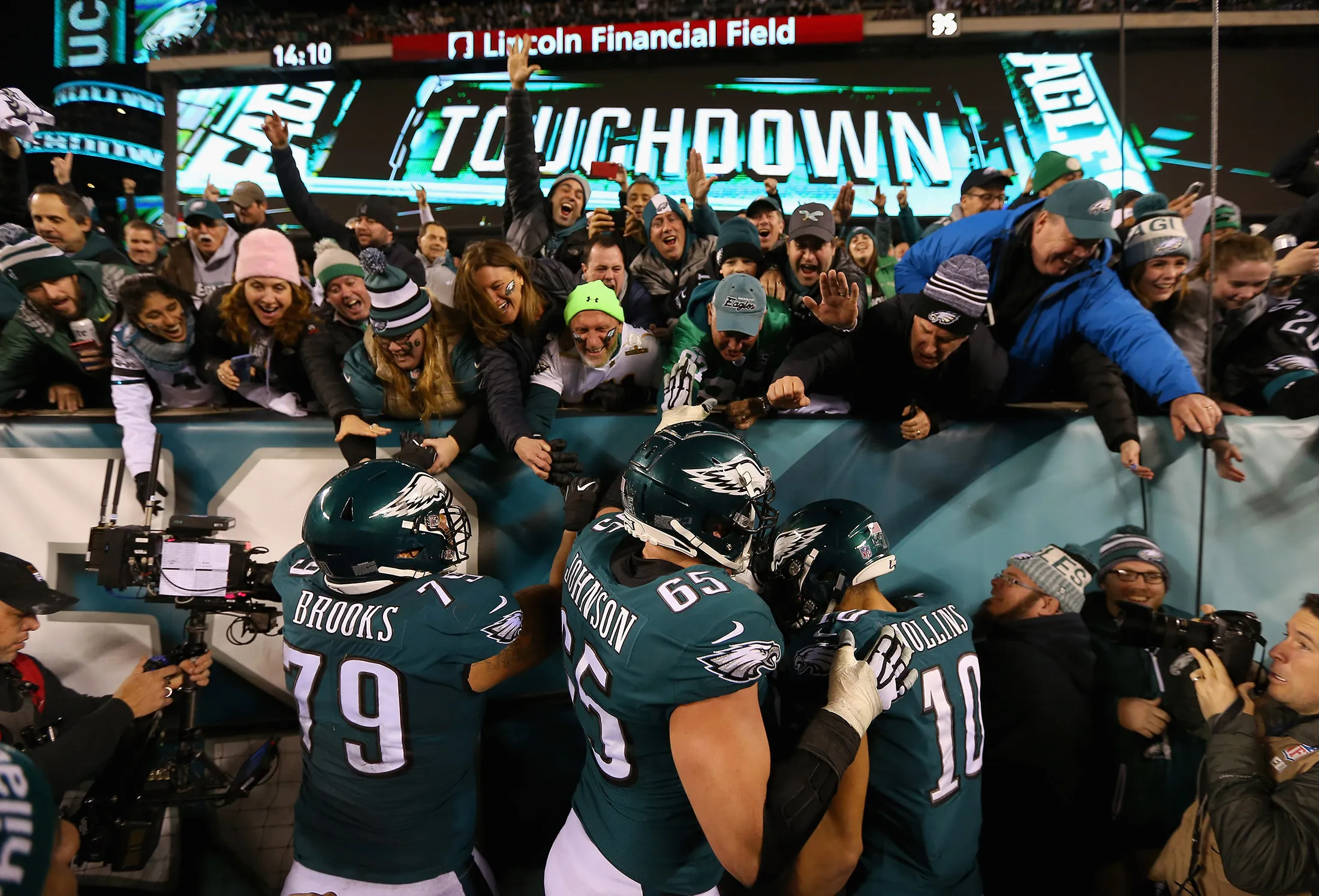 Brandon Brooks, Lane Johnson and Mack Hollins&nbsp;of the Philadelphia Eagles celebrate with&nbsp;fans after a fourth quarter touchdown against the Minnesota Vikings in the NFC Championship game on Jan. 21.&nbsp;