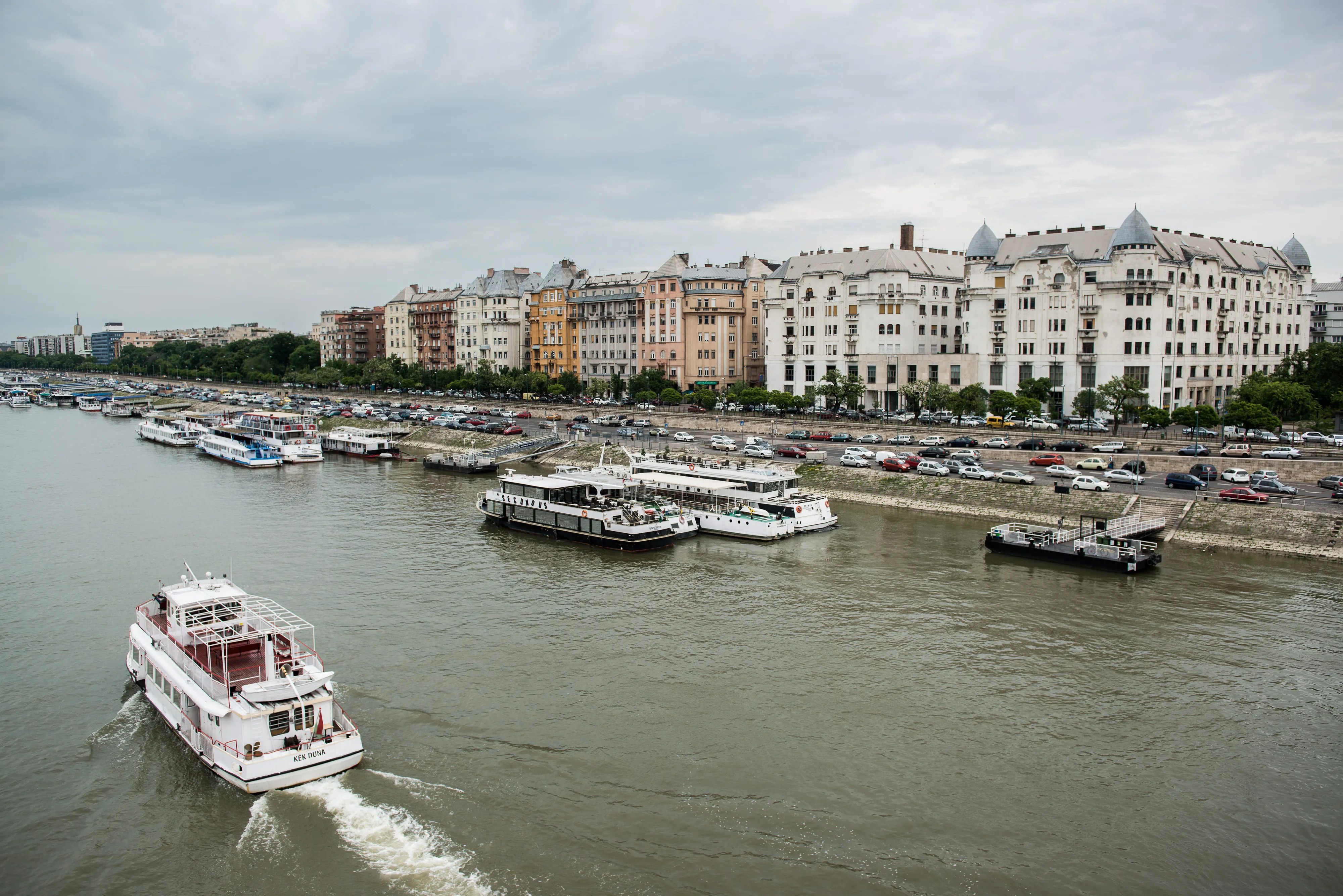 The 13th district attracts a cafe culture to the feet of Bauhaus buildings by the Danube. Photographer: Akos Stiller/Bloomberg
