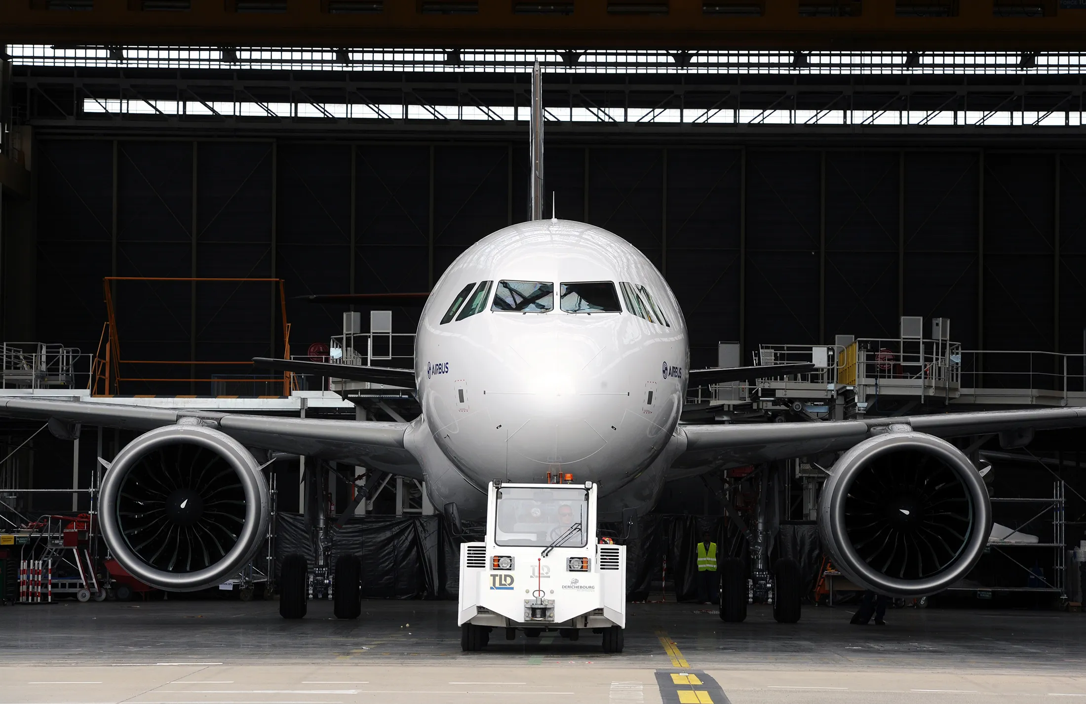 The first copy for tests of the 200 medium-haul A320neo passenger plane leaves its hangar on July 1, at the Airbus plant in Saint-Martin-du-Touch, near Toulouse, in southern France.