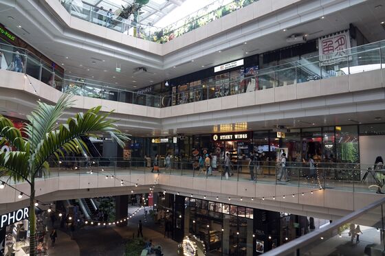 Singapore Malls Try Big Gambit Before Online Shopping Catches On