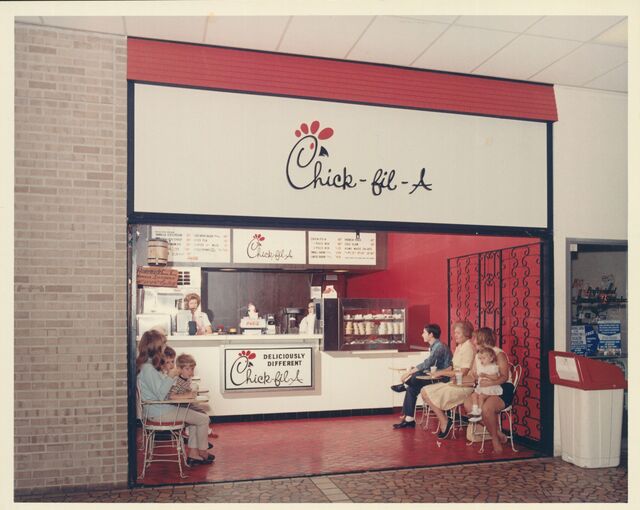 Customers sit inside a Chick-fil-a restaurant inside Atlanta's Greenbriar Mall. 