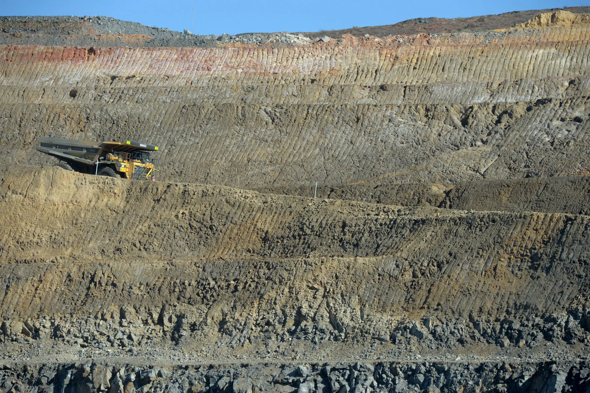 A dump trucks drives down an access ramp&nbsp;at an Evolution Mining Ltd. facility&nbsp;in Mungari, Australia.