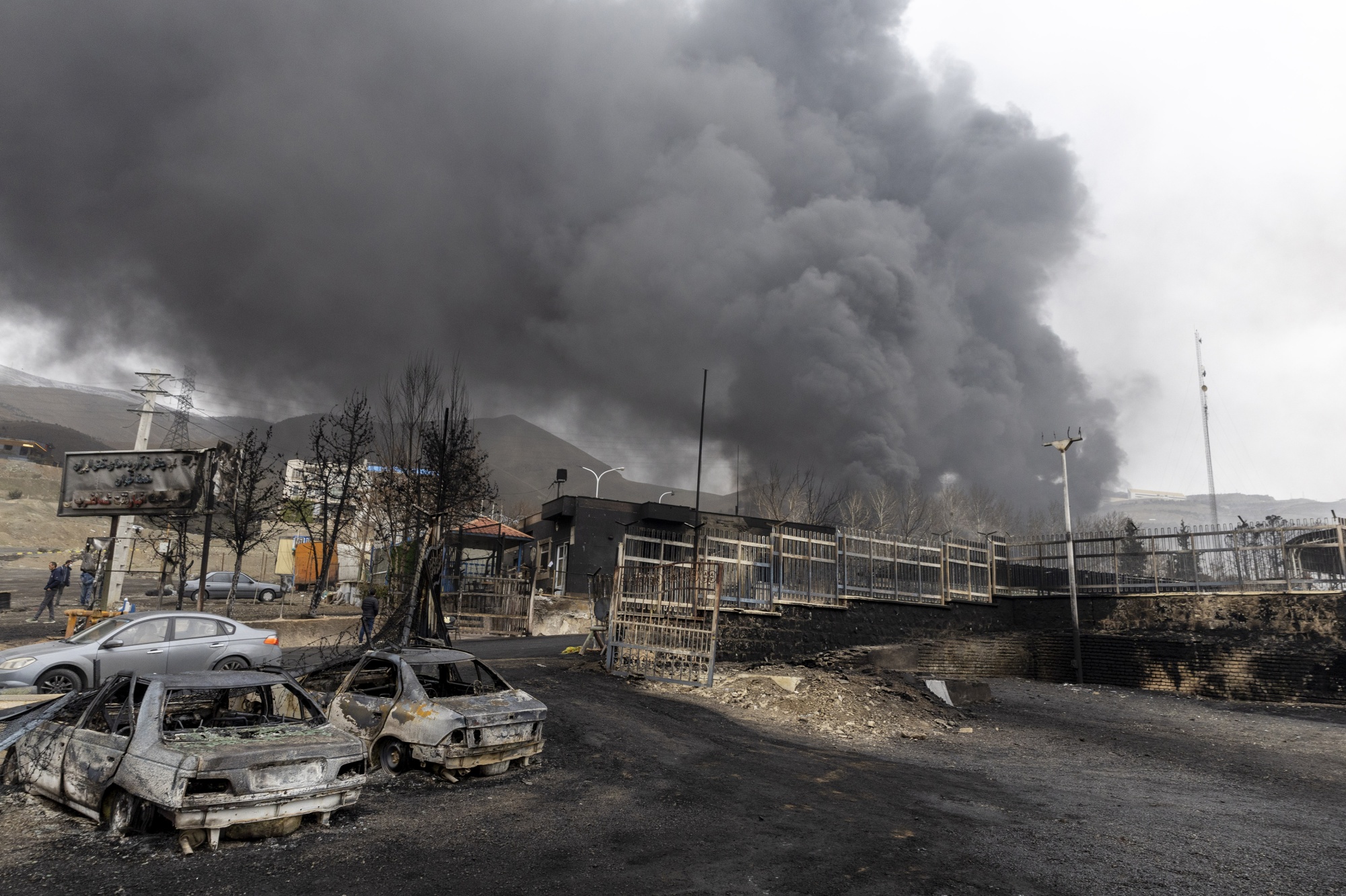 Smoke following overnight airstrikes on oil depots in Tehran, on March 8. Photographer: Majid Saeedi/Getty Images Europe