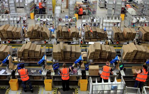 Amazon Speeds Warehouse Spending Amid EBay Delivery Threat