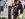 Pedestrians fill a bottle with water in the City of London in 2022
