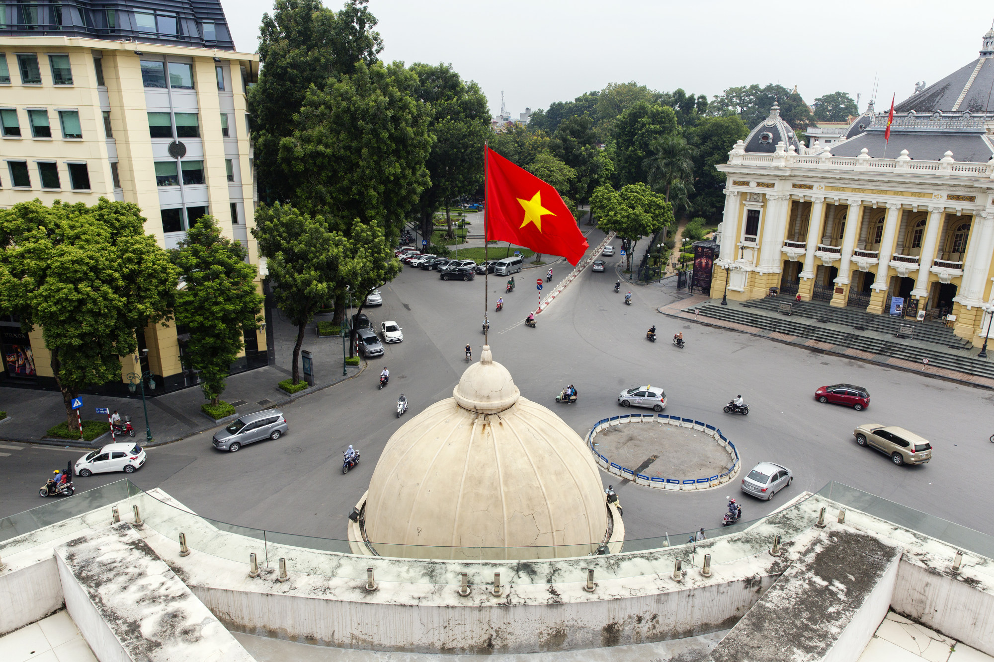 A Vietnamese flag above the Hanoi Stock Exchange in Hanoi.