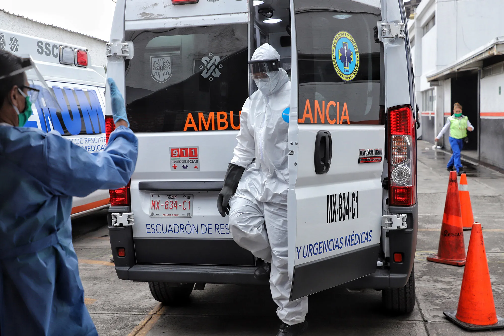 A medic gets out of the ambulance after transporting a patient infected with Coronavirus&nbsp;in Mexico City.