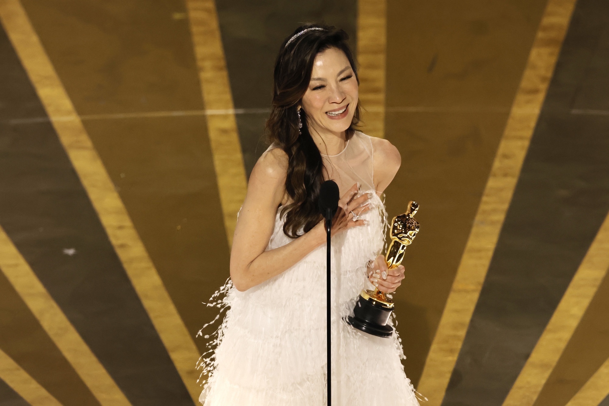 Michelle Yeoh accepts the Best Actress award during the 95th Annual Academy Awards on March 12.