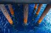 Oil extraction pipes emerge from the water at the Casablanca oil platform, operated by Repsol SA, in the Mediterranean Sea off the coast of Tarragona, Spain, on Tuesday, June 28, 2016. The exploration and production division, which pumped 714,000 barrels of oil equivalent per day in the quarter, posted a 17 million-euro profit, up from a 190 million-euro loss a year earlier.