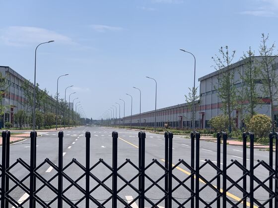 Deserted Factories Show How China Electric Car Boom Went Too Far