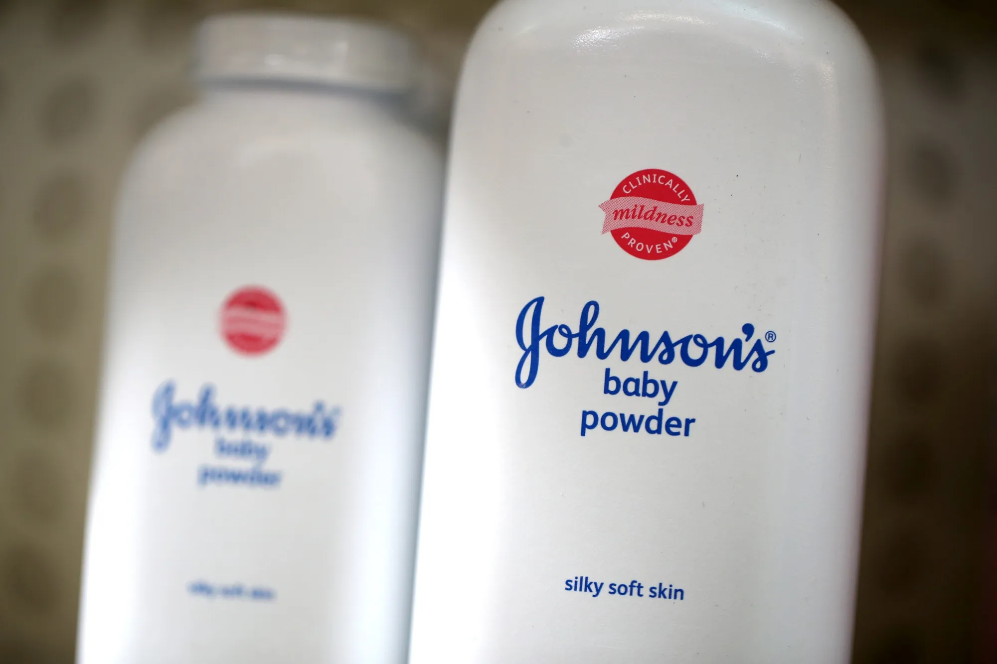Containers of Johnson's baby powder made by Johnson and Johnson.