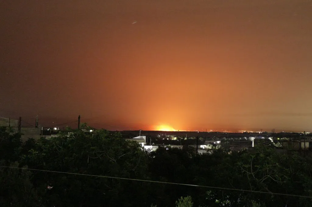 A blast illuminates the night sky after an alleged napalm bomb attack by Assad Regime and Russia in the de-escalation zone of&nbsp;&nbsp;Idlib,&nbsp; on June 1.