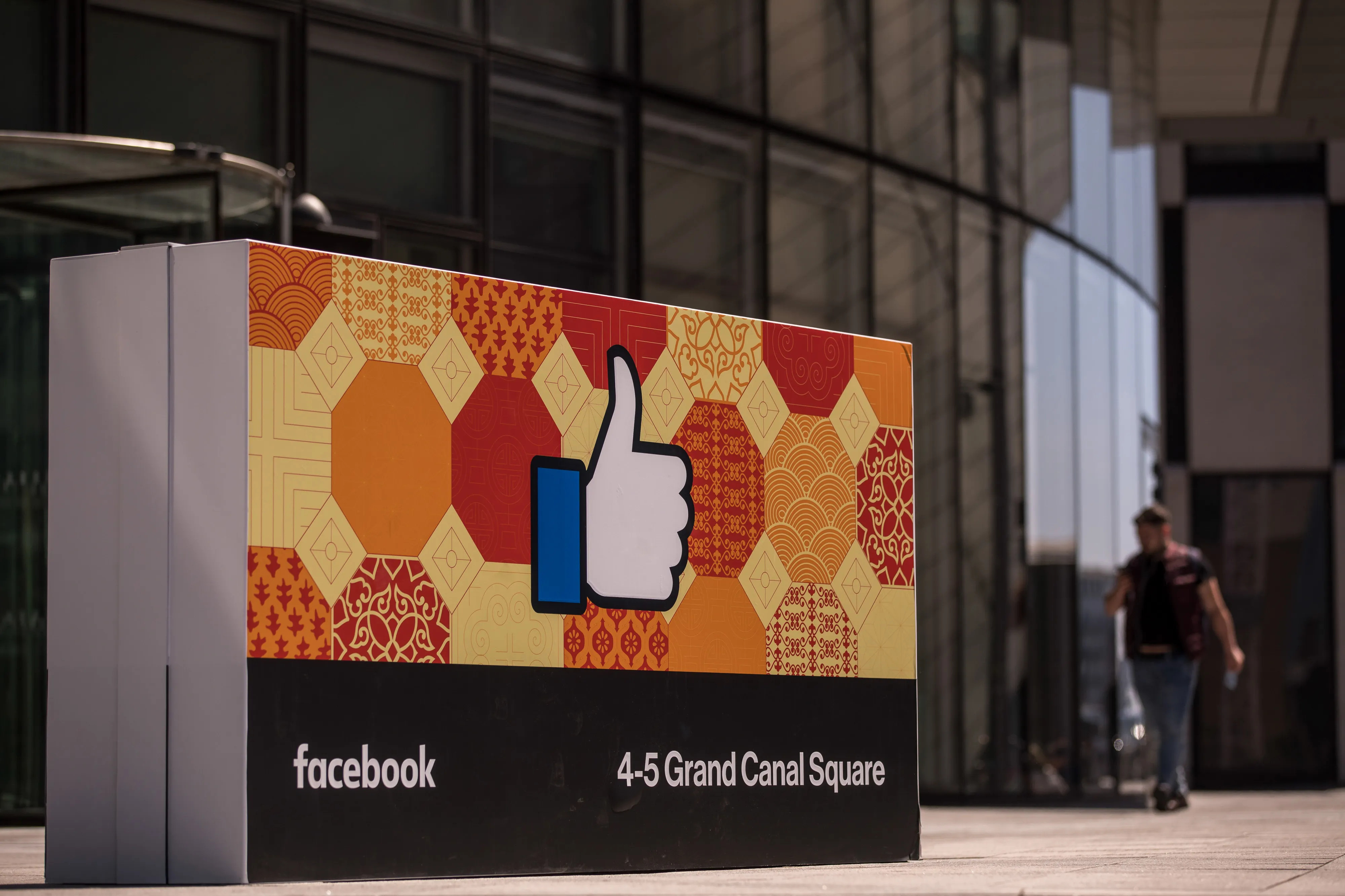 A thumbs up symbol stands at the entrance to the Facebook European headquarters in Dublin.