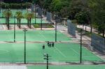 Police officers walk through the closed-off football pitches at Victoria Park on June 4.&nbsp;