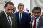 John Kerry, US special presidential envoy for climate, center, arrives for a meeting at the United Arab Emirates pavilion at the COP27 on Tuesday.