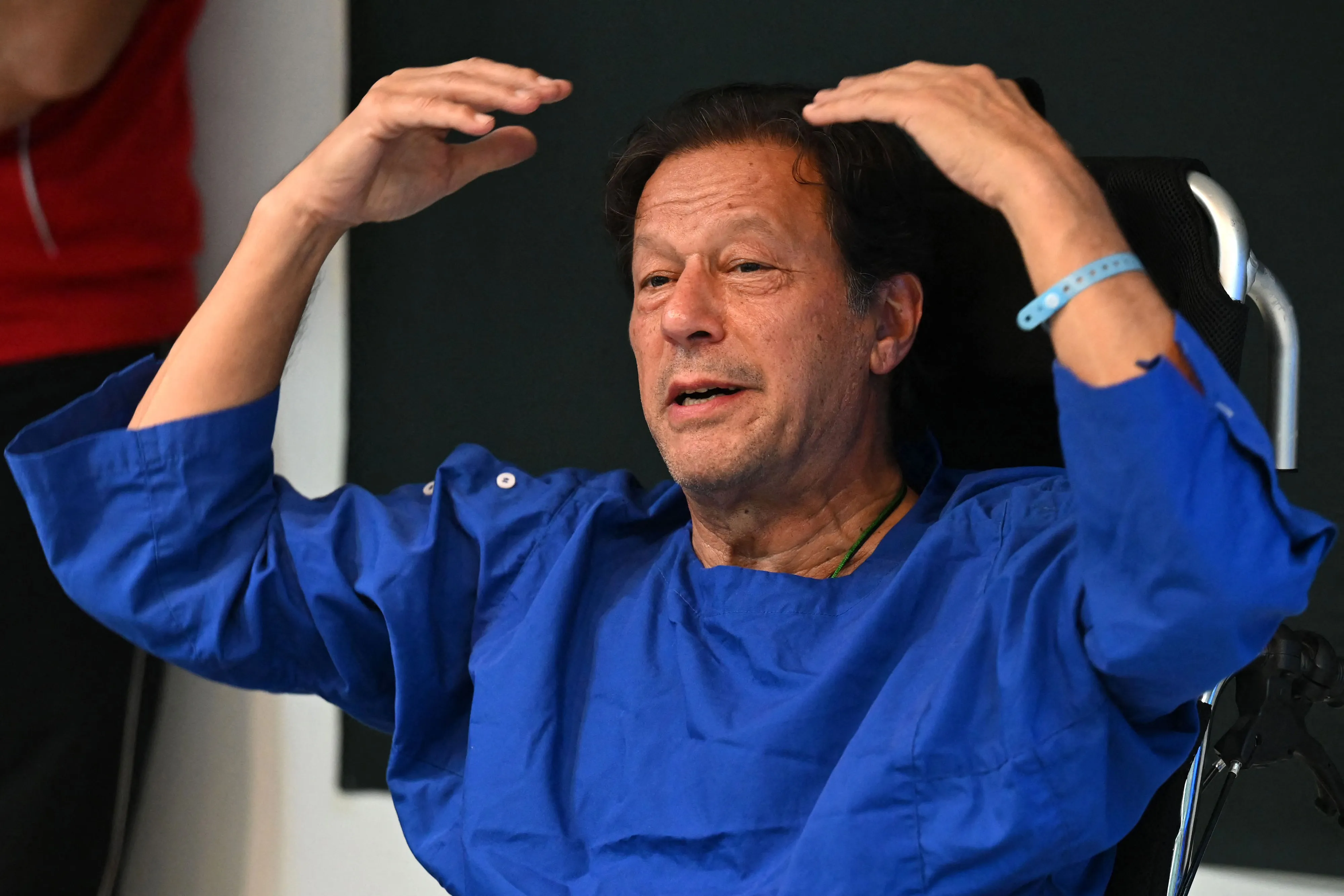 Imran Khan addresses the media at a hospital in Lahore, a day after an assassination attempt.