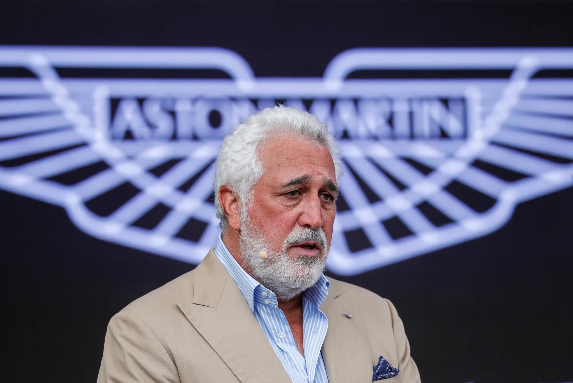 Aston Martin Chairman Lawrence Stroll speaks during the reveal of the Valhalla plug-in hybrid supercar