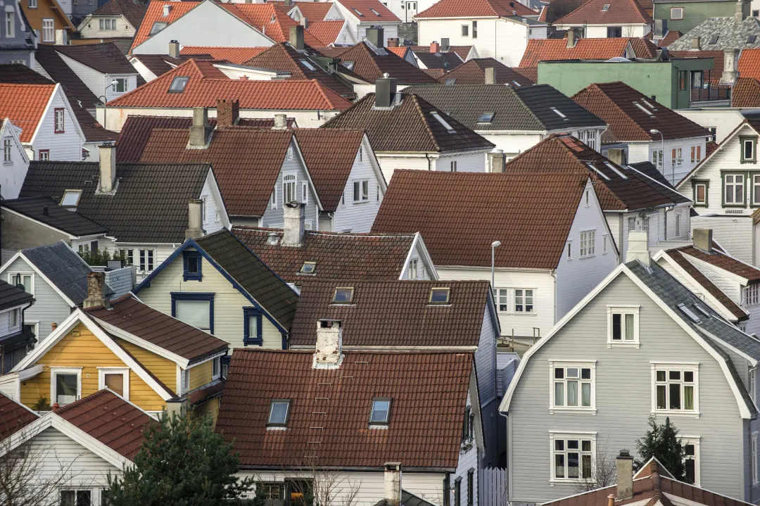 Rooftops sit above residential houses in the city center in Stavanger, Norway, on Tuesday, March 4, 2014.&nbsp;