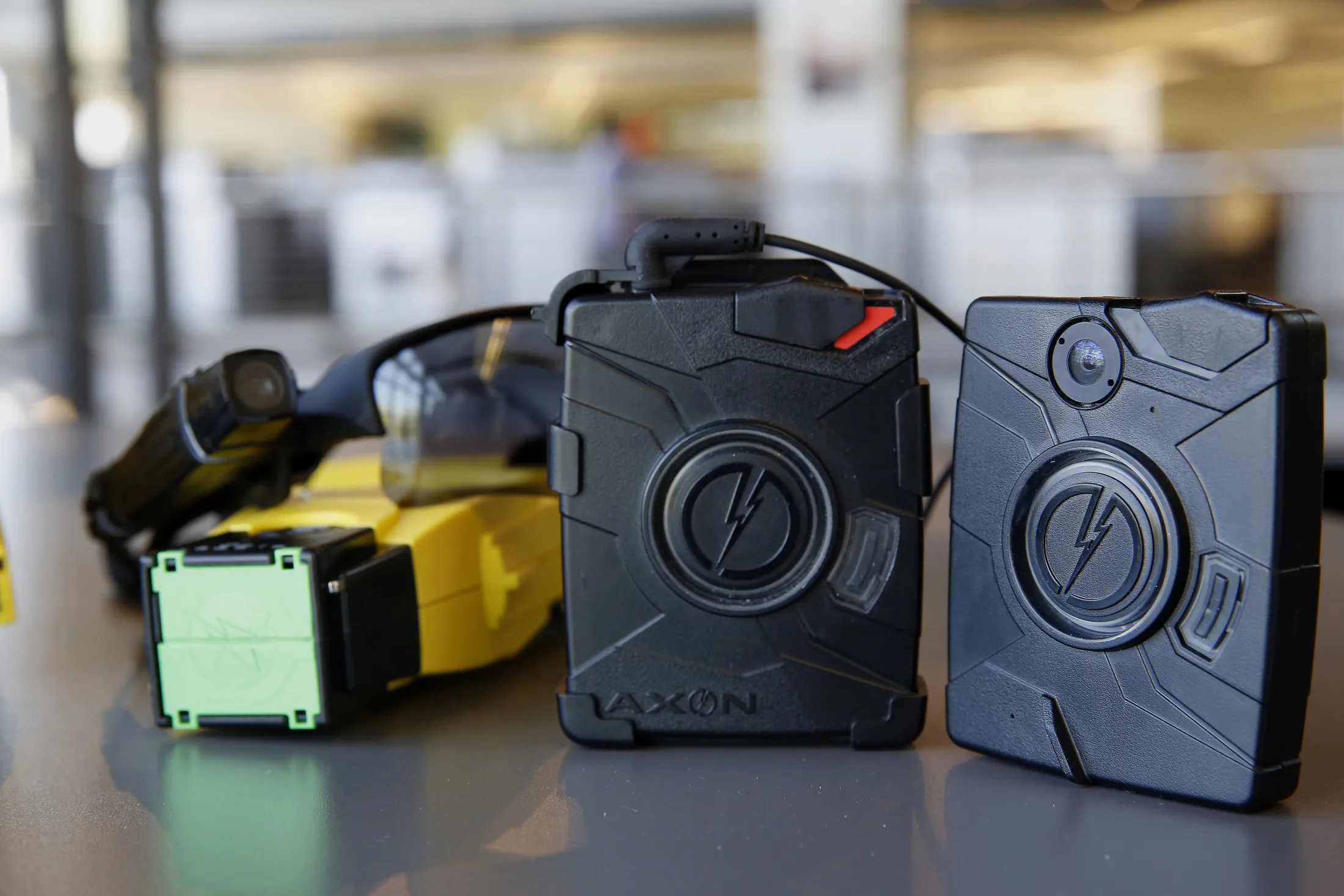 AXON police body cameras and a&nbsp;Taser weapon.