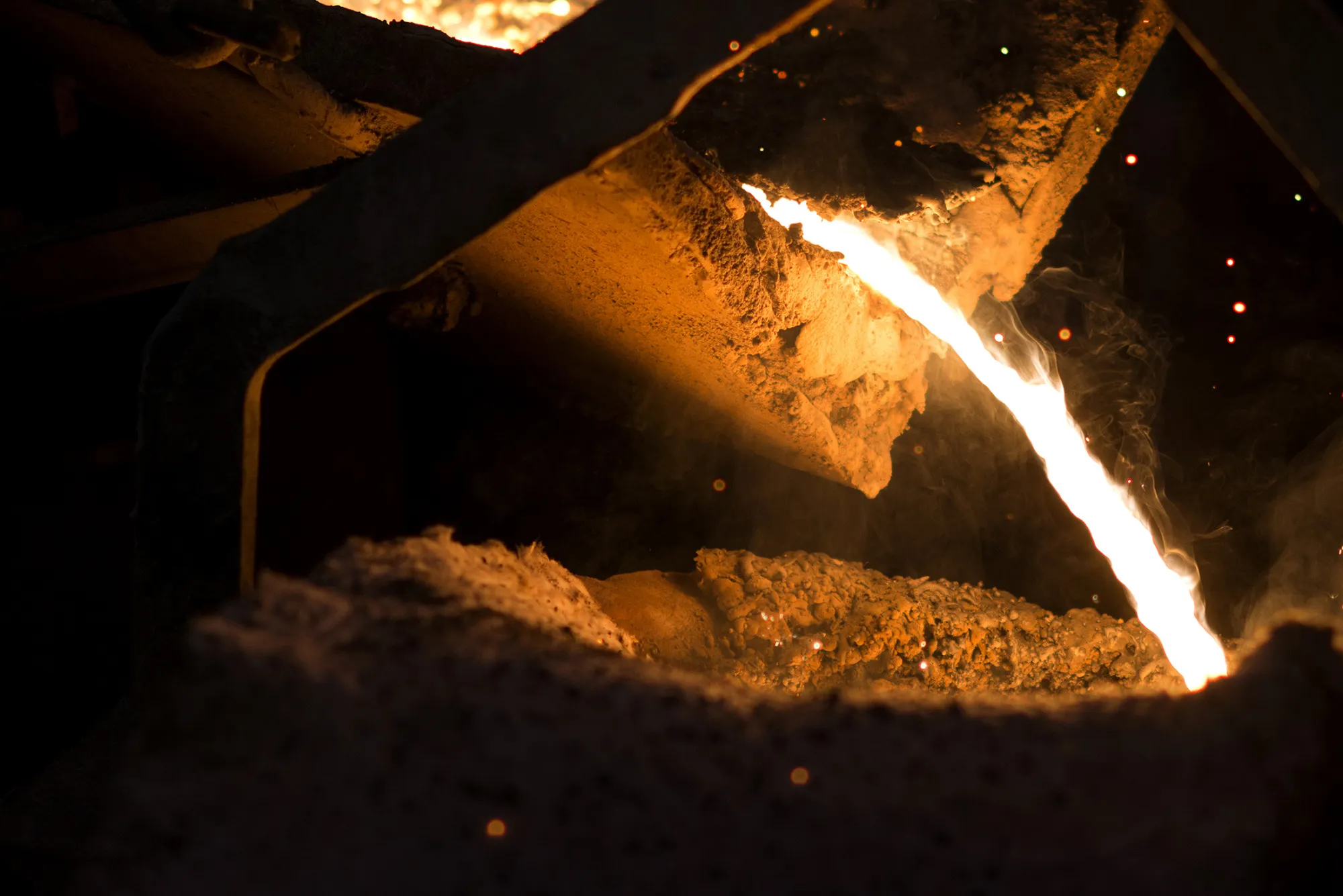Molten steel is cured from a furnace into a ladle during the metal smelting process at the Quaker City Castings facility in Salem, Ohio, U.S., on Wednesday, Aug. 24, 2016. The U.S. Census Bureau is scheduled to release durable goods figures on August 25.

