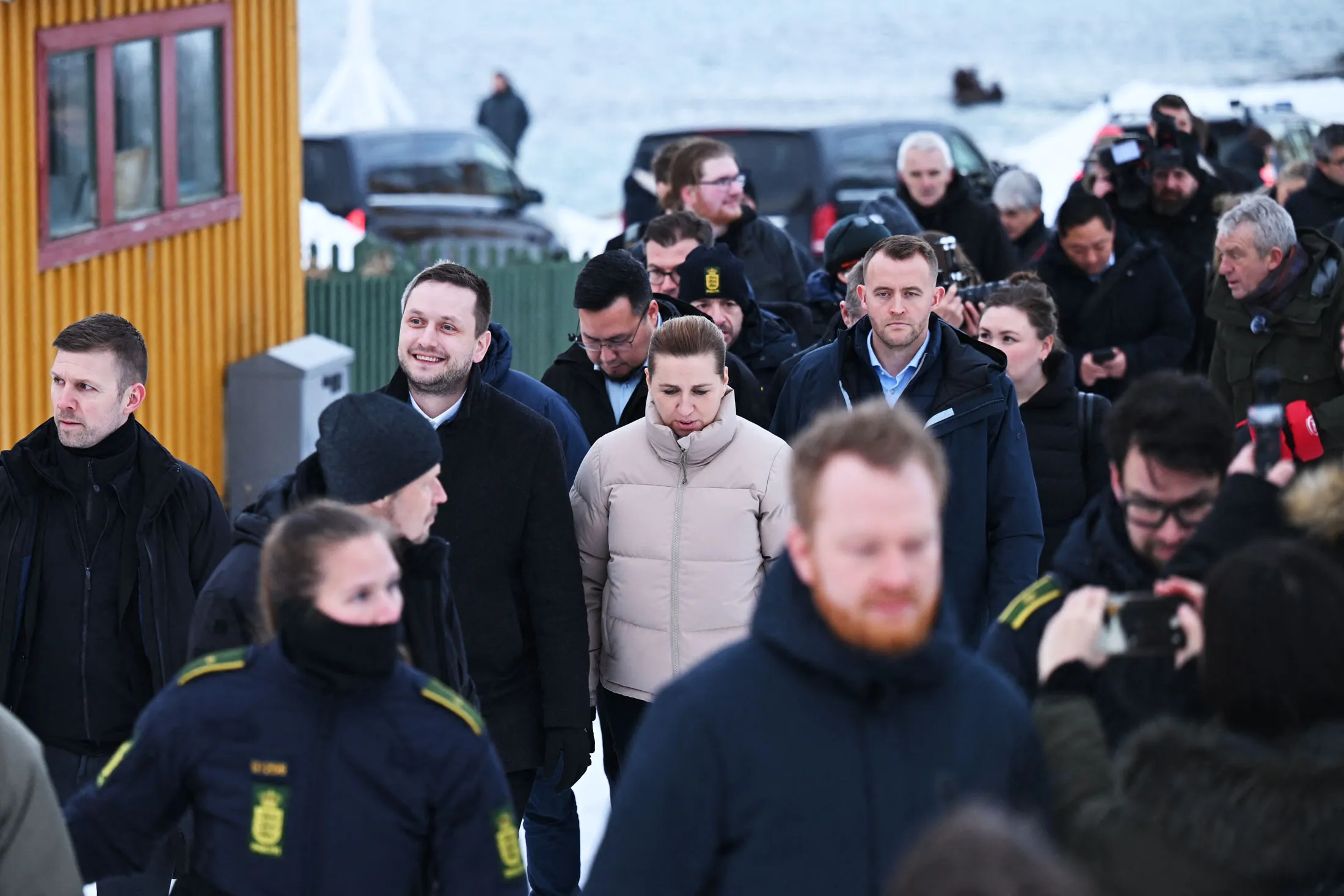 Mette Frederiksen, center, and Greenland’s Prime Minister Jens-Frederik Nielsen, center left, in Nuuk, on Jan. 23.