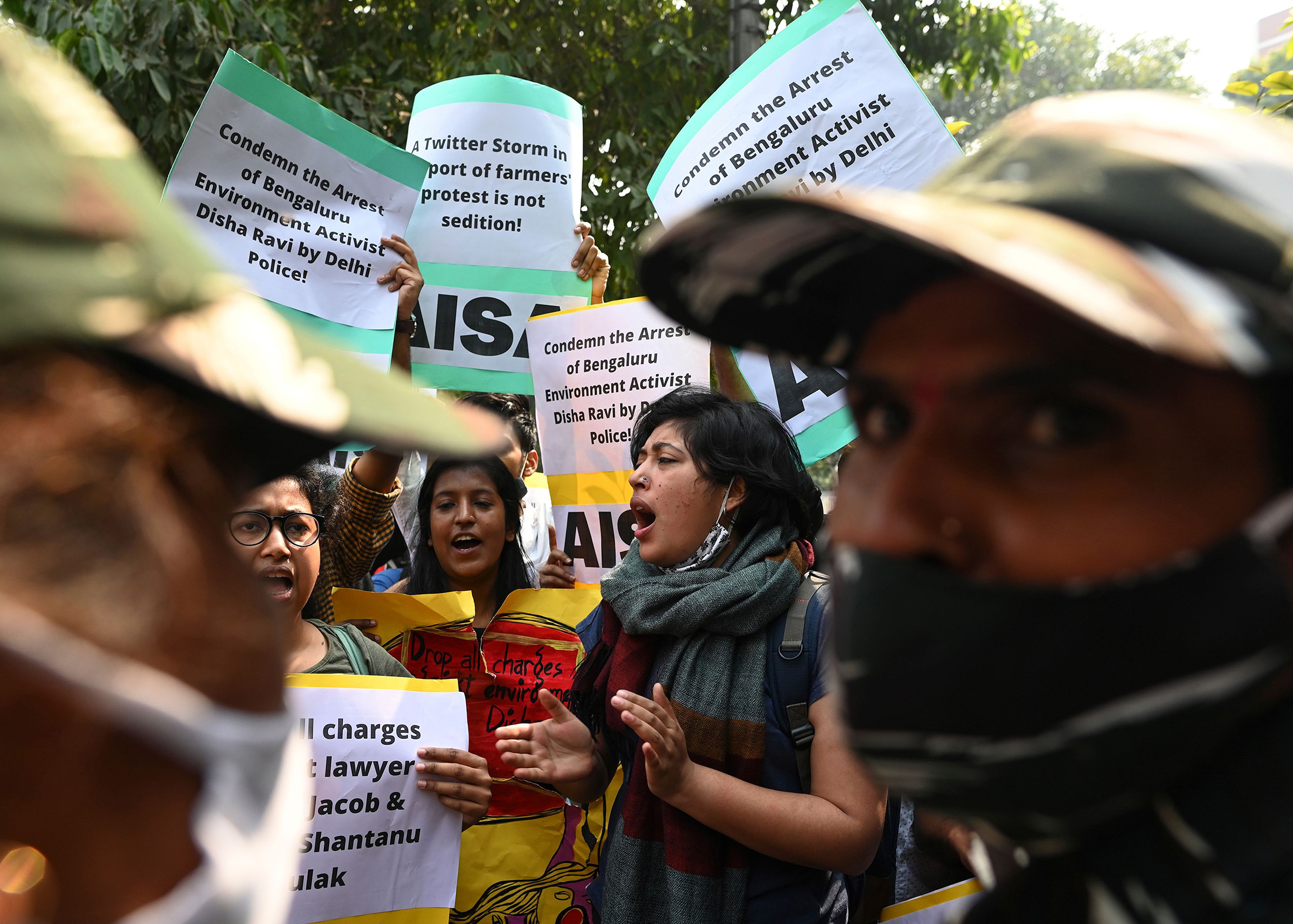 Demonstrators shout slogans during a protest against the arrest of Disha Ravi in New Delhi, on Feb. 16.
