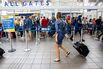 Travelers At LaGuardia Airport As Trump Travel Ban Goes Into Effect