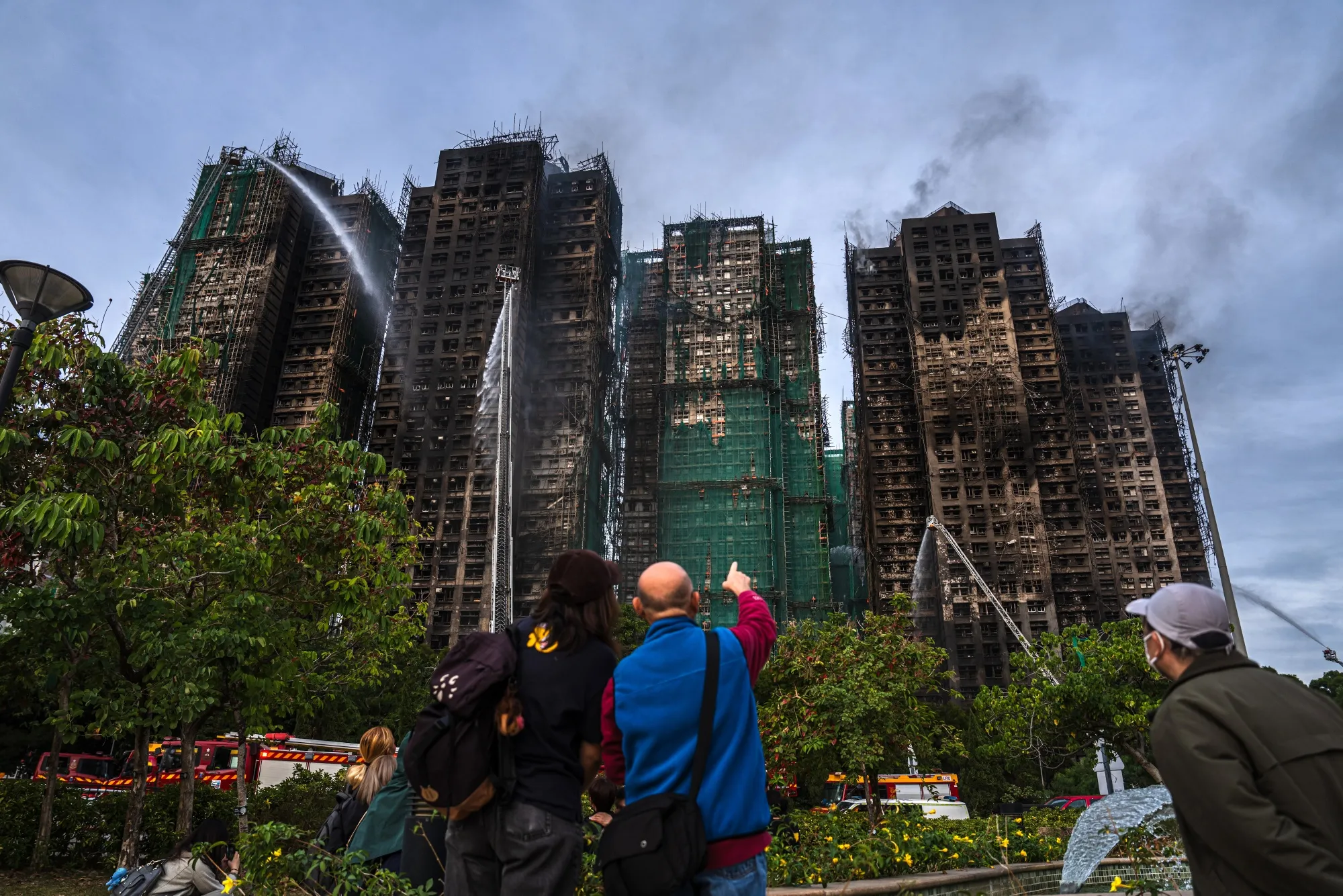 Hong Kong Fire Report to Put Government Accountability in Focus - Bloomberg