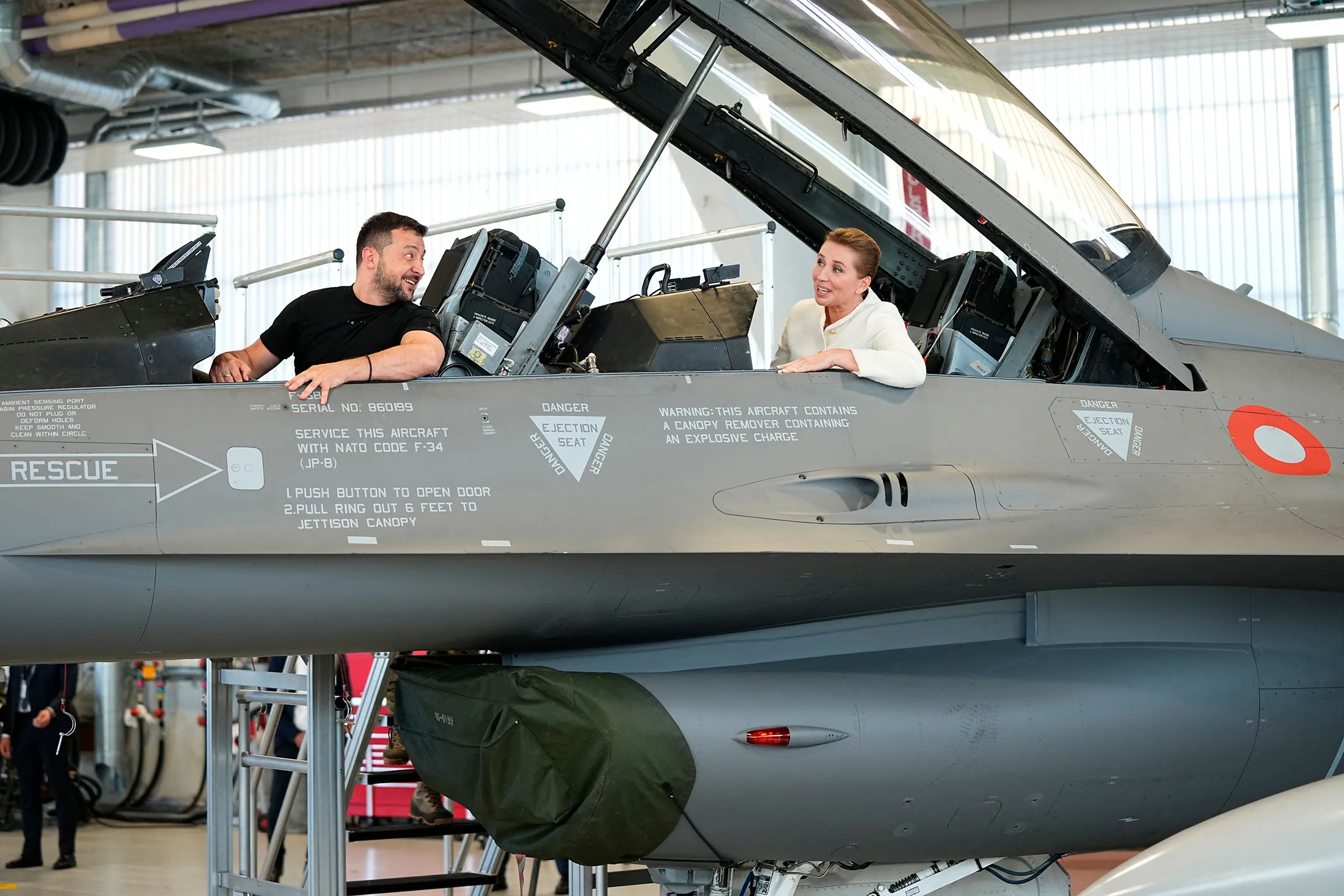 Ukrainian President Volodymyr Zelensky&nbsp;and Danish Prime Minister Mette Frederiksen&nbsp;sit in a F-16 fighter jet in the hangar of the Skrydstrup Airbase in Vojens, northern Denmark, on Aug.&nbsp;20.