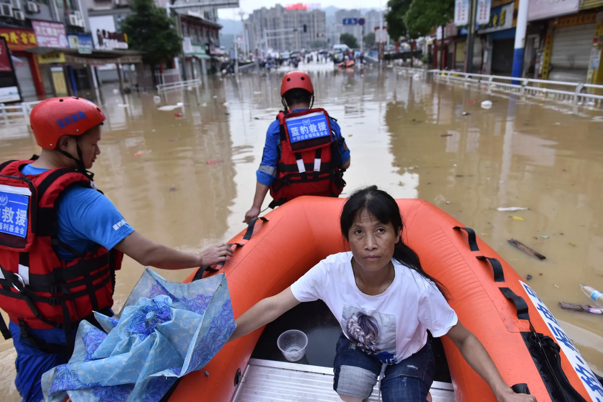 Rescuers use rubber boats to evacuate stranded residents following a flood in&nbsp;Fujian Province on June 19.