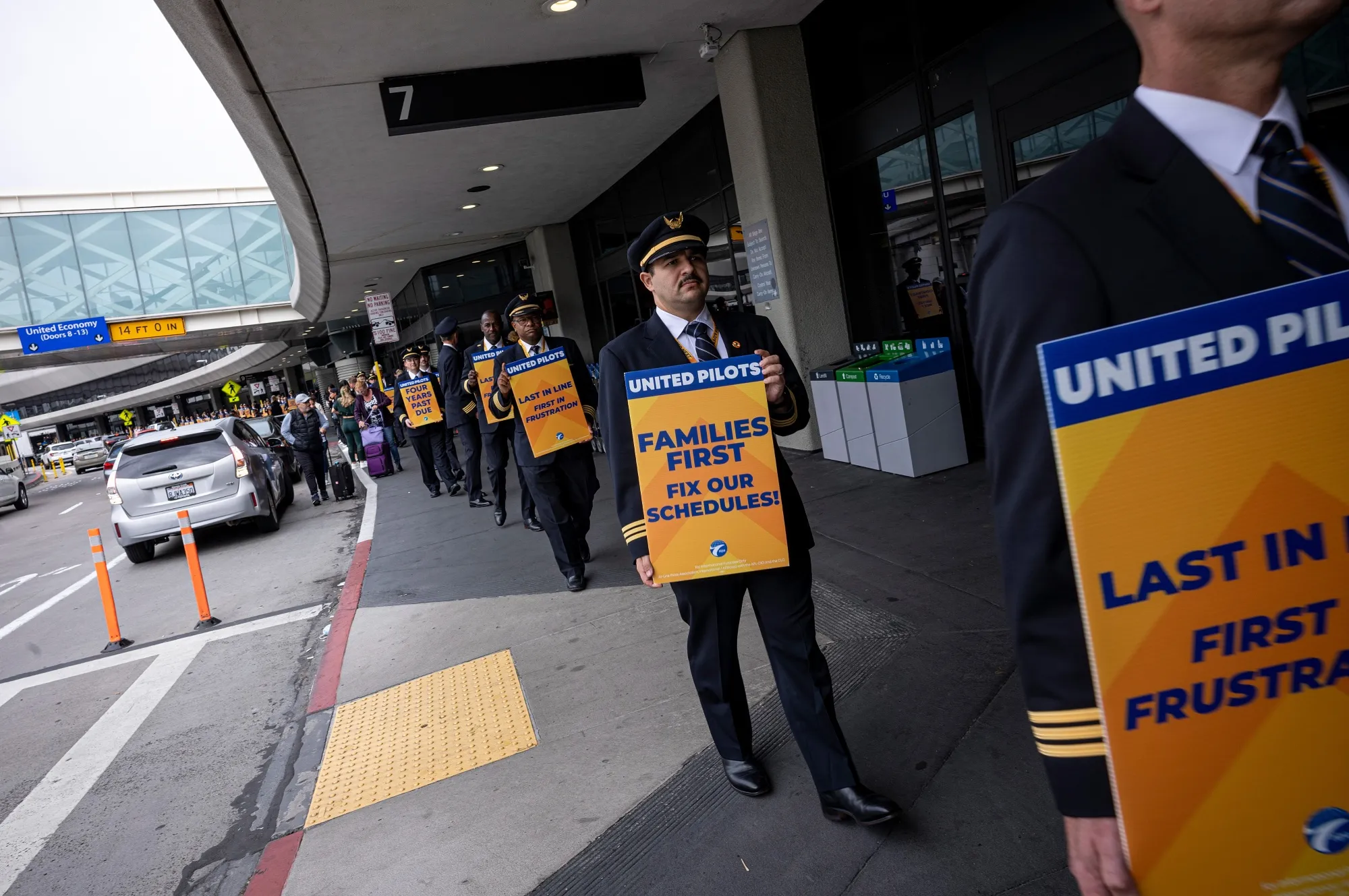 United Airlines pilots picket outside San Francisco International Airport in May.