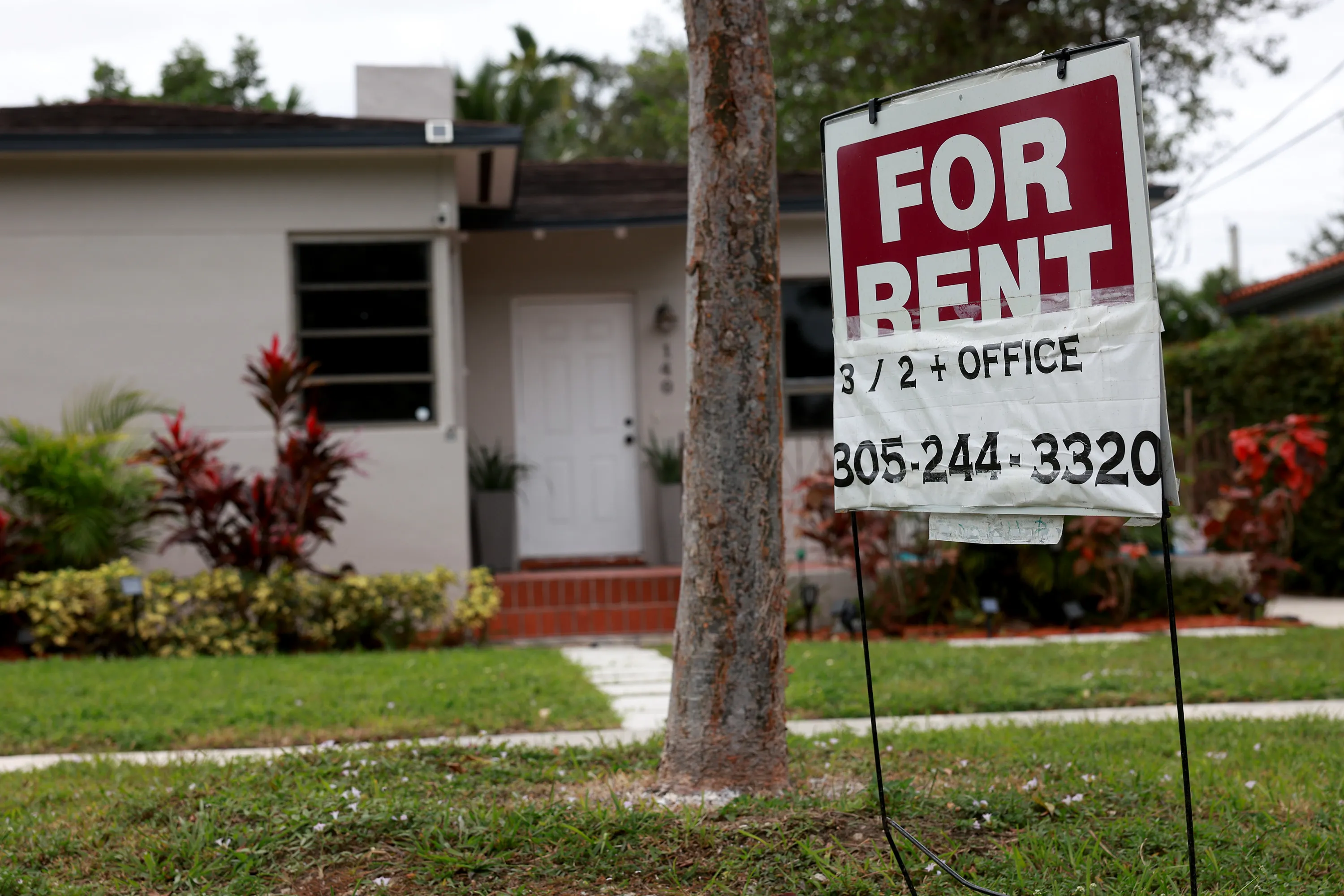 A "for rent" sign in front of a home in Miami, Florida.