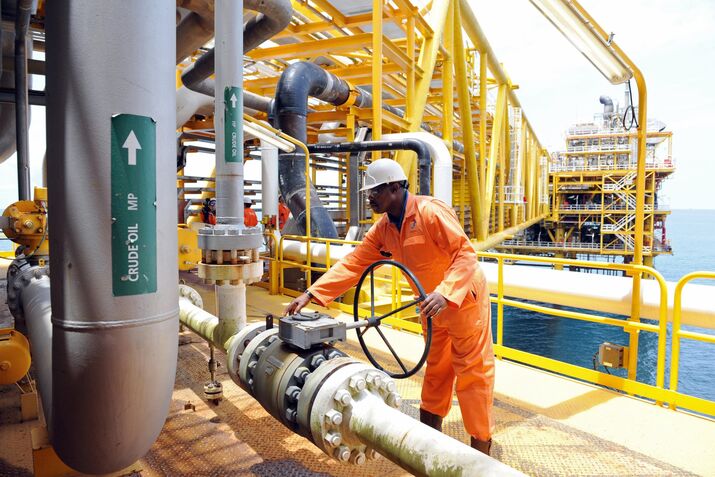A worker inspect facilities on an upstre