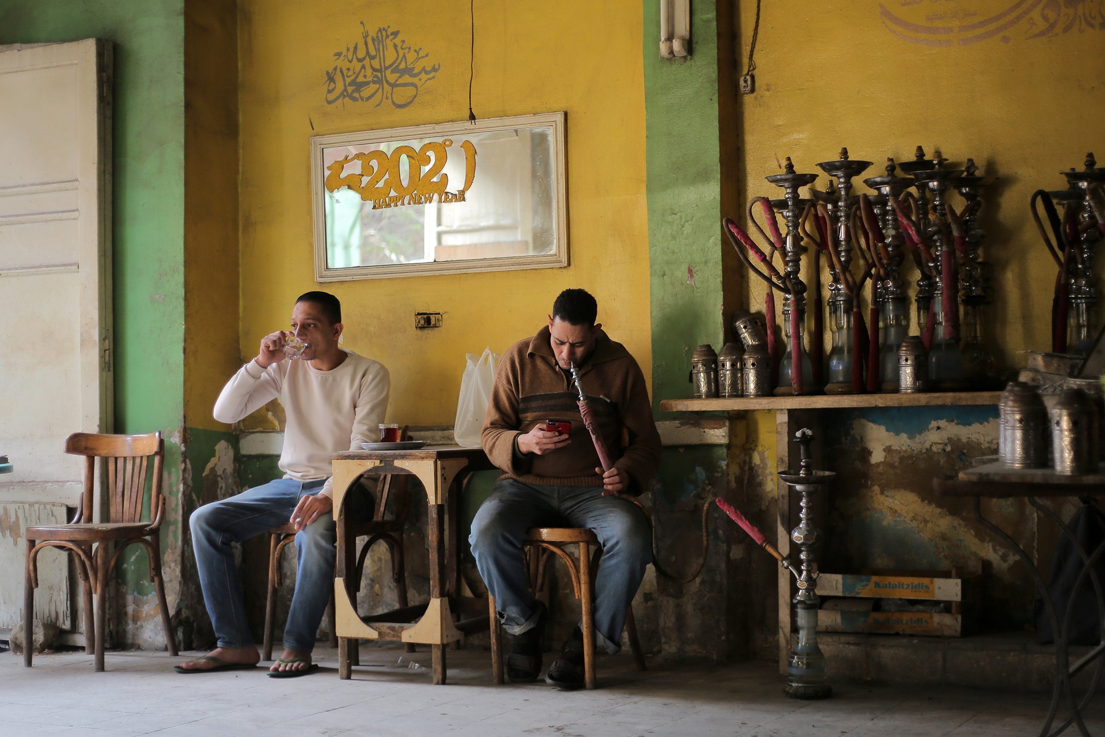 Customers smoke&nbsp;hookah at a cafe in Cairo, Egypt,&nbsp;on January 1, 2023 in Cairo, Egypt.