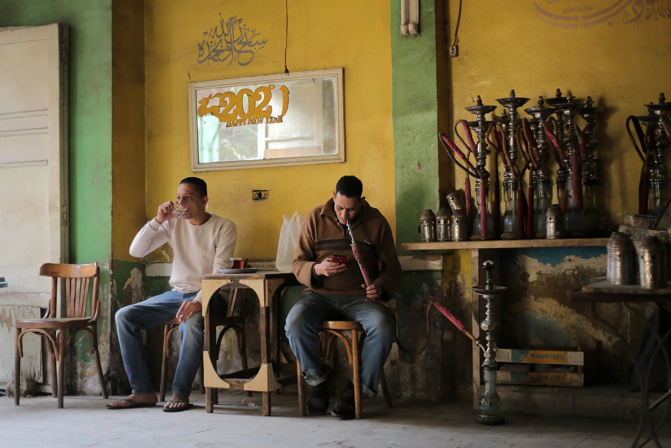 Customers smoke&nbsp;hookah at a cafe in Cairo, Egypt,&nbsp;on January 1, 2023 in Cairo, Egypt.