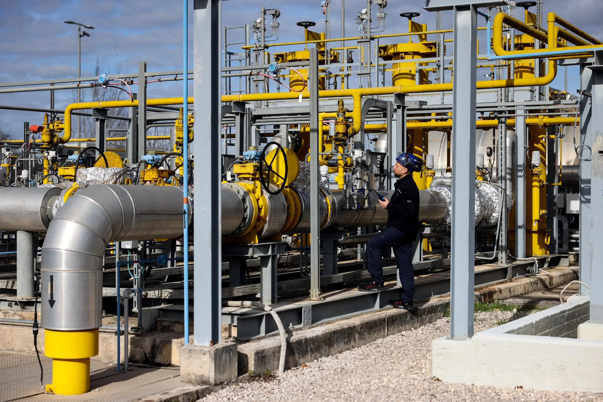 A worker inspects a pressure gauge during routine maintenance at the combined cycle gas turbine power plant, operated by Sorgenia SpA, in Aprilia, Italy.
