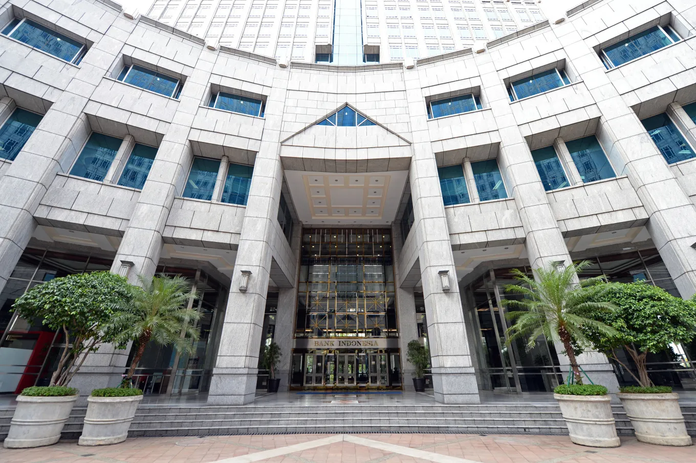 A sign sits above the entrance to the Bank Indonesia in Jakarta, Indonesia.