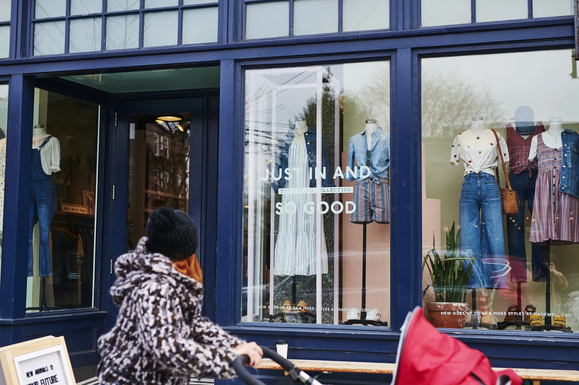 A pedestrian passes a Madewell store in the Brooklyn borough of New York.