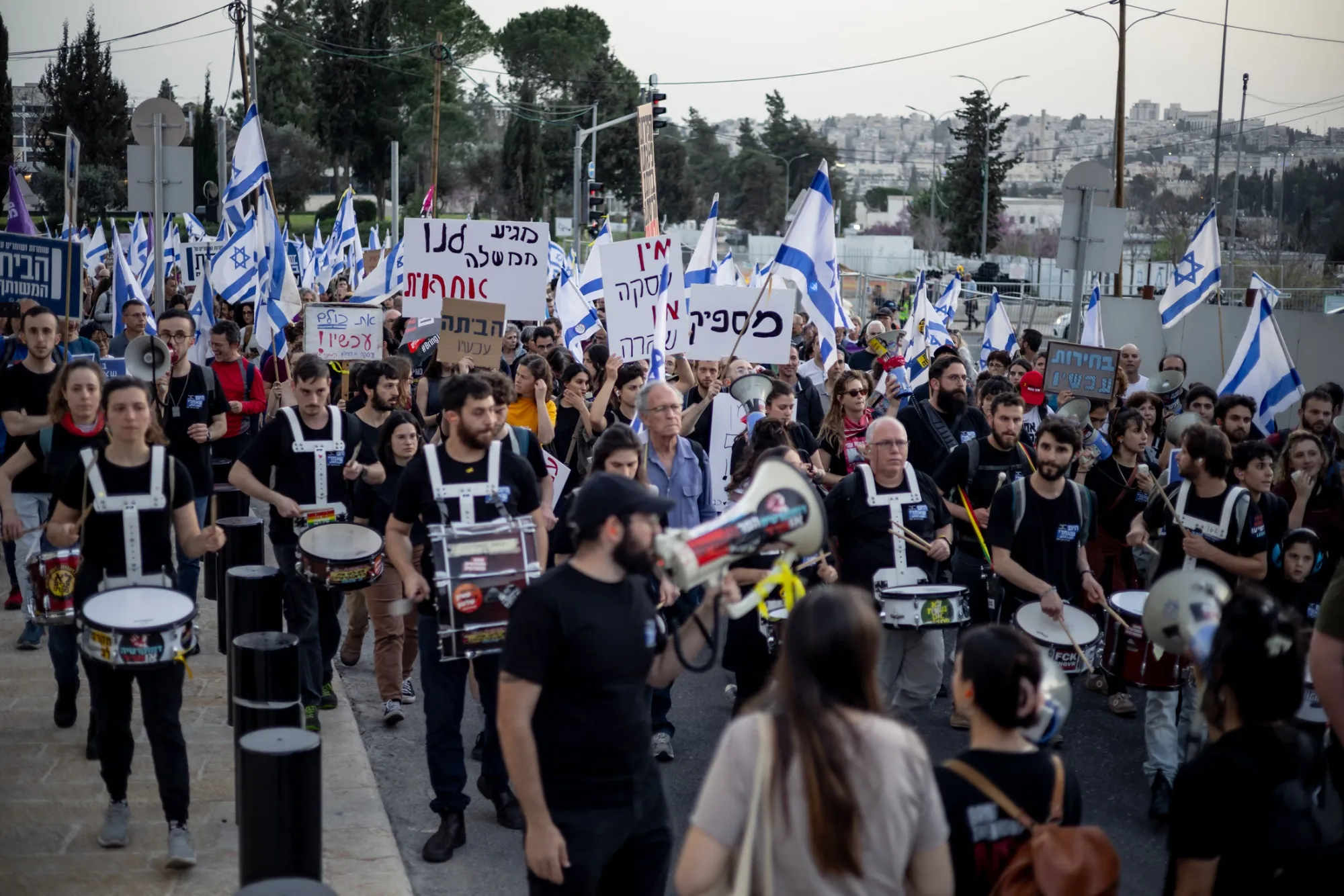 Demonstrators protest near the Knesset in Jerusalem on March 31.