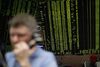 A trader works in S&P 500 stock index options pit at the Chicago Board Options Exchange (CBOE).
