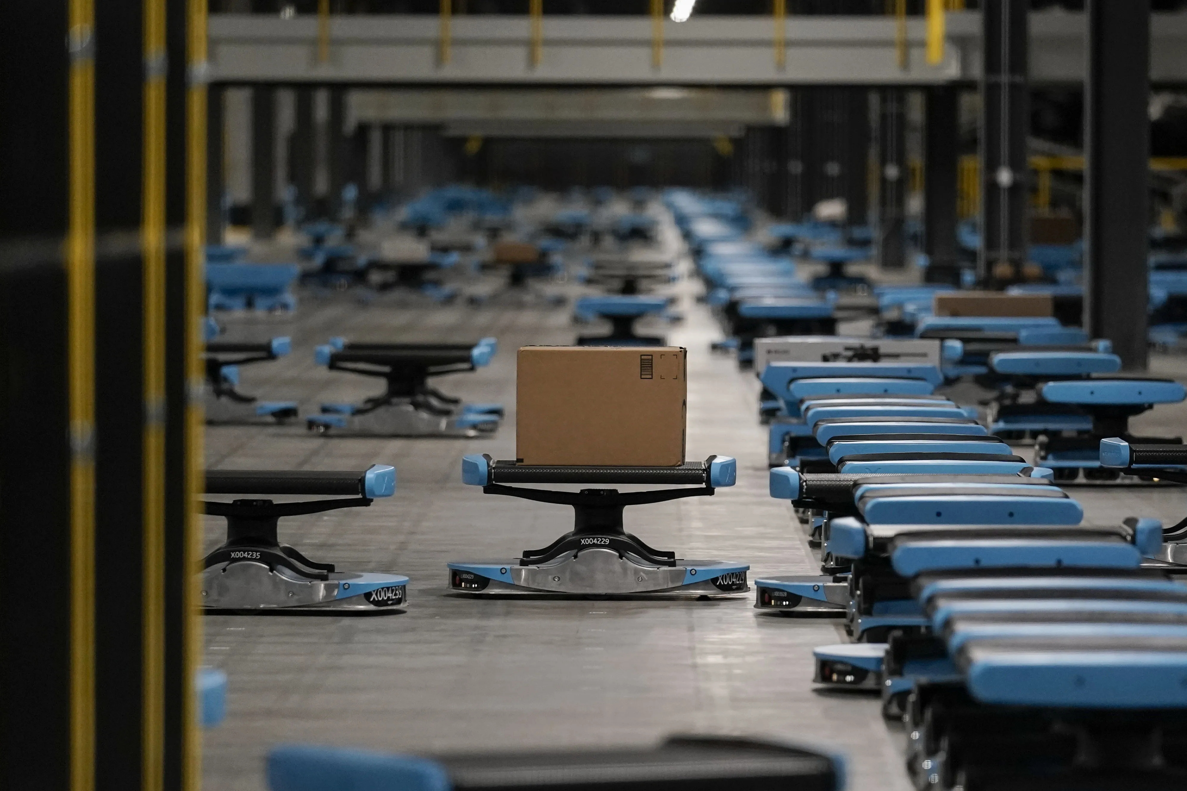 Robots sort and transport packages at the Amazon Air Hub in Hebron, Kentucky.