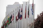 International flags fly outside the Secretariat building at the United Nations headquarters in New York before the U.S. left the 2015 nuclear accord with Iran, a decision which may now be reversed.&nbsp;
