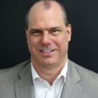 Headshot of William O'Dowd IV "Bill"