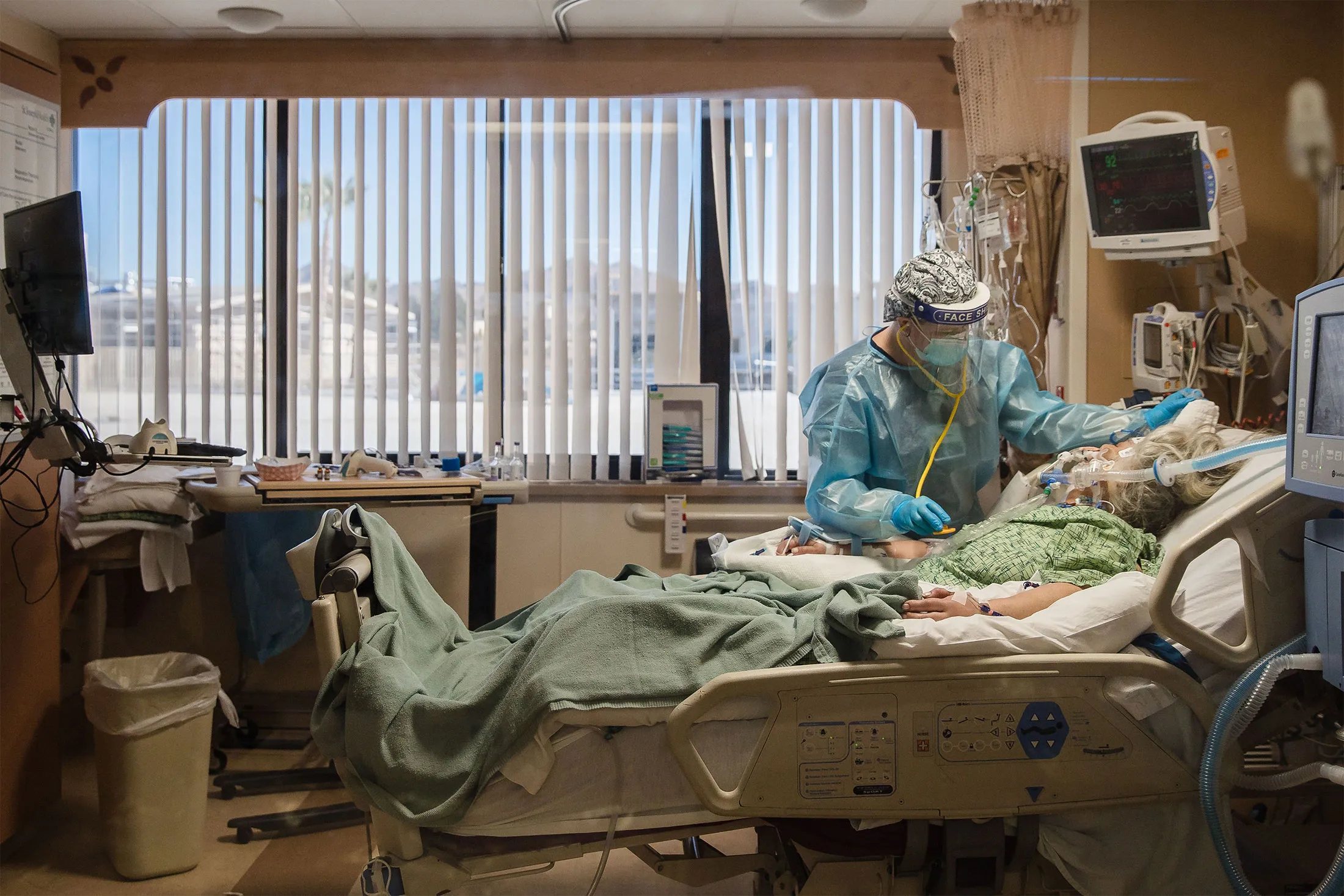 A Registered Nurse tends to a Covid-19 patient at Providence St. Mary Medical Center in Apple Valley, Calif. on&nbsp;Jan. 11.&nbsp;