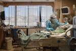 A Registered Nurse tends to a Covid-19 patient at Providence St. Mary Medical Center in Apple Valley, Calif. on Jan. 11. 